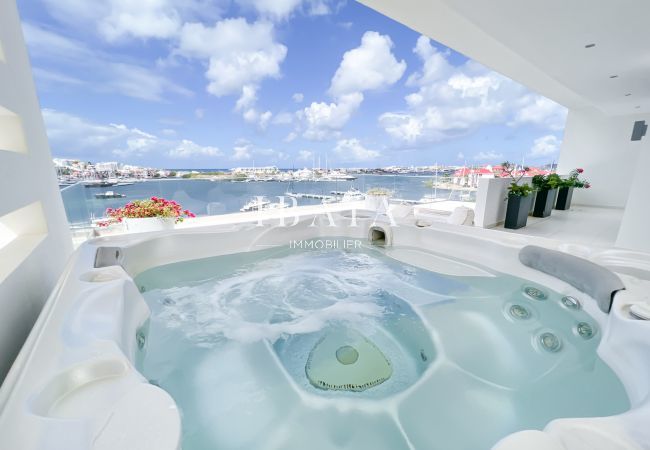 Enjoy a moment of relaxation in the Jacuzzi overlooking Simpson Bay
