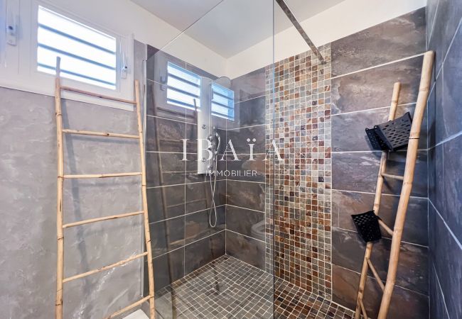 Pleasant bathroom with walk-in shower