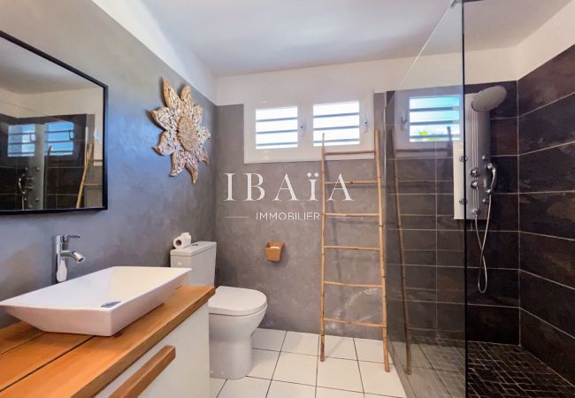 Pleasant bathroom with walk-in shower