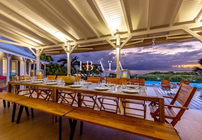 beautiful dining table for 12-14 persons with view on the pool and the ocean 