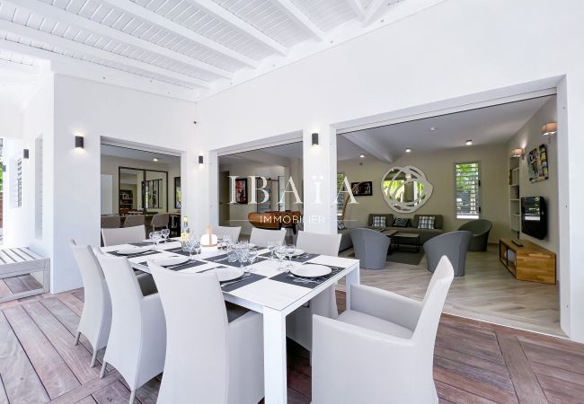 Superb 8 person dining table located on the poolside terrace