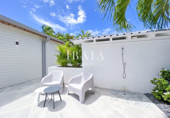 Small lounge and outdoor shower