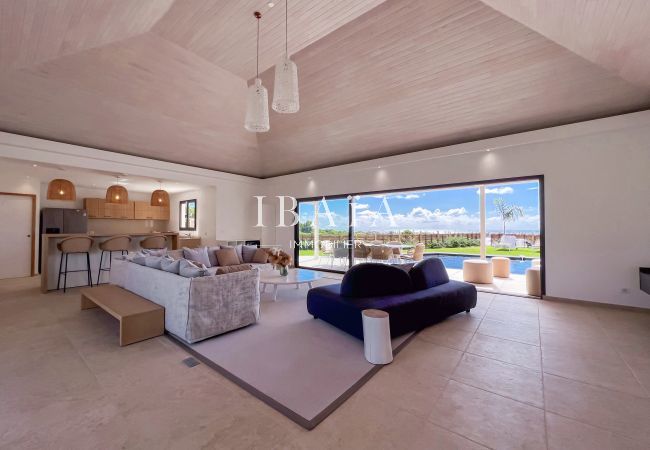 Modern living room with pool view