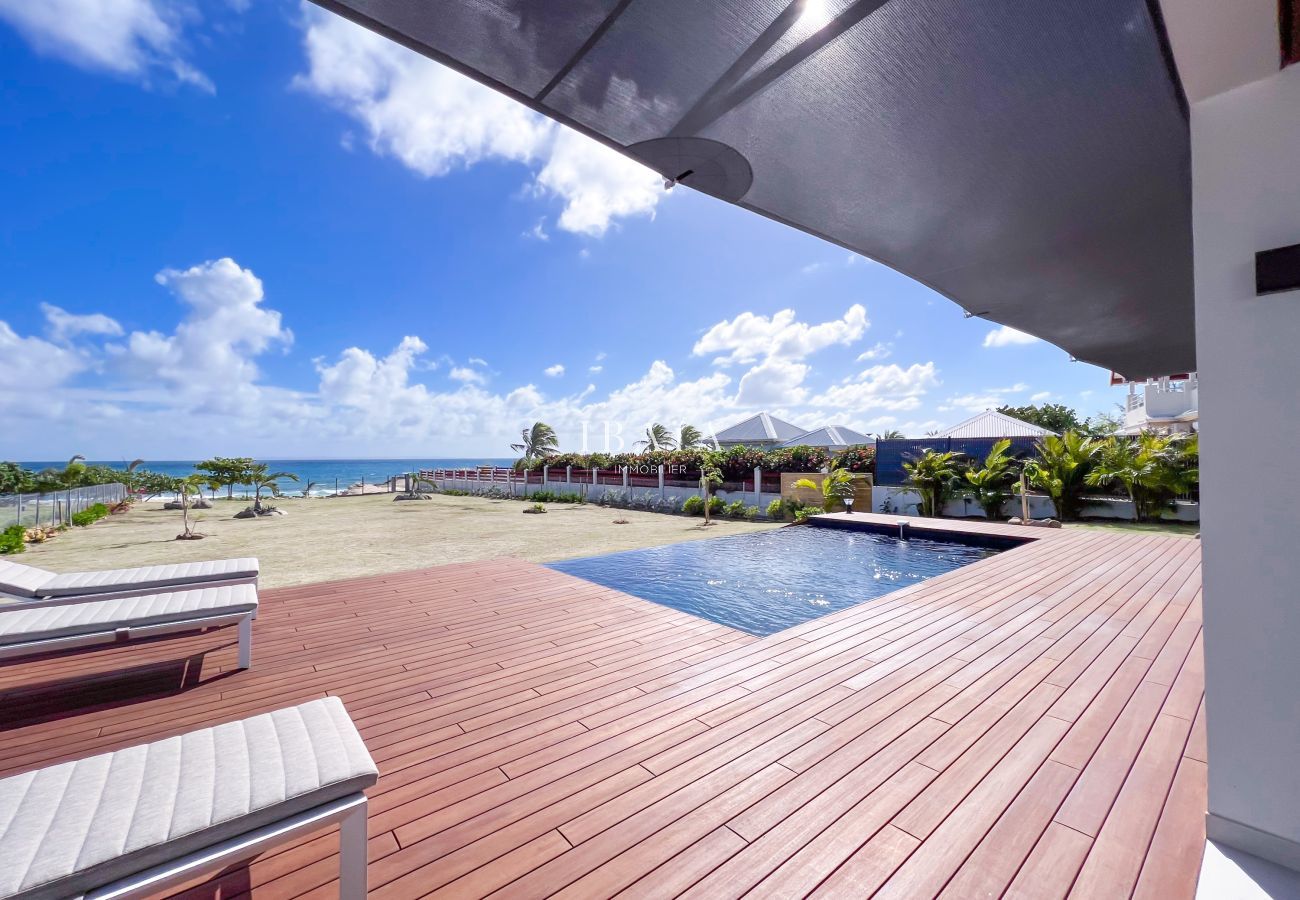 Wood deck with pool and sea view