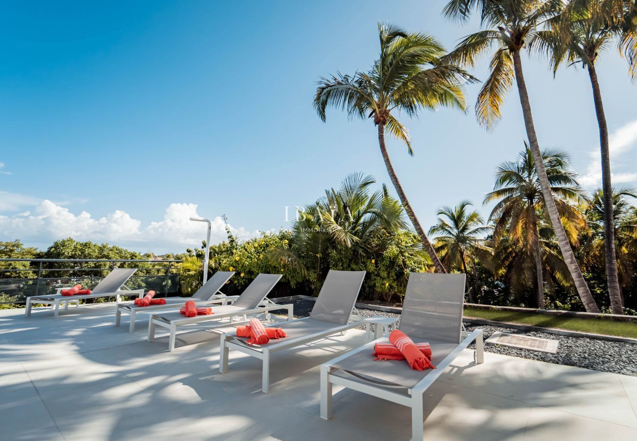 Sun loungers and terrace solarium at Villa Julia in Sainte-Anne